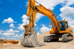 Yellow Excavator at Construction Site